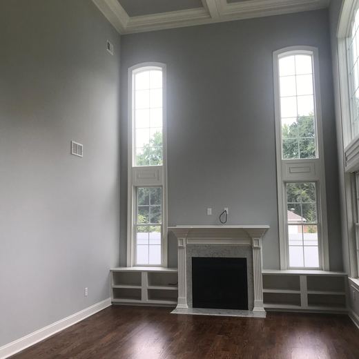 Great room with coffered ceiling and tall windows — Storybook Homes NJ