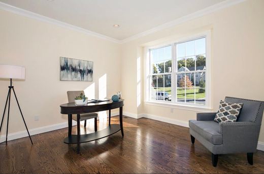 Home office with desk and reading chair — Storybook Homes NJ